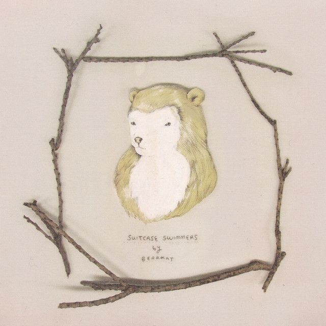 Her Suitcase+Swimmers